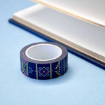 Roll of blue washi tape with pink flowers, light blue accents, diamonds, filagree and gold foil