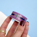 Purple washi tape with blue and gold  flowers, a blue band and gold foil filagree