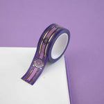Purple washi tape with pink and gold  flowers, a pink band and gold foil filagree