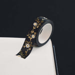 Black washi tape with white flowers and gold foil foliage