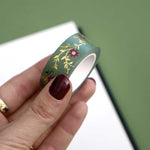 Green washi tape with dark pink flowers and gold foil foliage