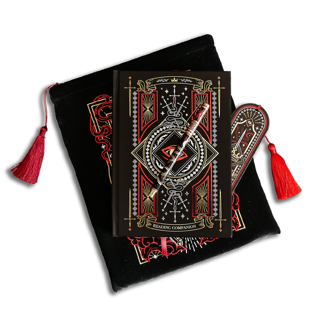 The Destiny Awaits Reading companion bundle shows a reading companion, pen, bookmark and embroidered book sleeve stacked on top of each other. The romantasy inspired products are all black with red, white and gold detailing and all feature a design with a motif of a dragon eye, swords and a crown.