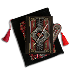 The Destiny Awaits Reading companion bundle shows a reading companion, pen, bookmark and embroidered book sleeve stacked on top of each other. The romantasy inspired products are all black with red, white and gold detailing and all feature a design with a motif of a dragon eye, swords and a crown.