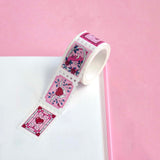 White and pink washi tape with hearts, roses, a crescent moon, leaves and chillies