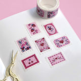 White and pink washi tape with hearts, roses, a crescent moon, cherries, birds and strawberries