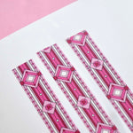 Pink washi tape with small pink and red hearts and diamonds