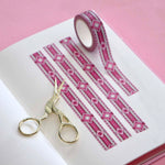 Pink washi tape with small pink and red hearts and diamonds