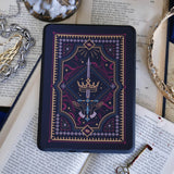 Decorative dark and moody kindle sticker against a dark background e reader