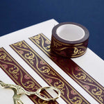 Red washi tape with pink flowers and gold foil filagree