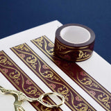 Red washi tape with pink flowers and gold foil filagree