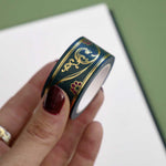 Green washi tape with red flowers and gold foil filagree