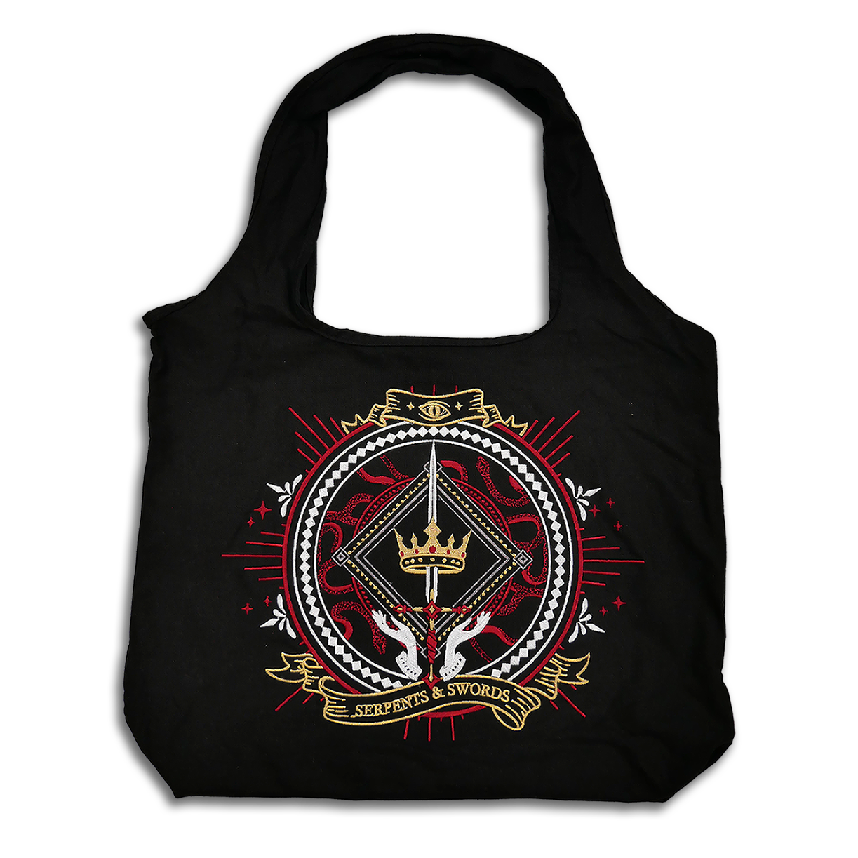 The black fantasy book inspired Serpents & Swords tote bag by The Quirky Cup Collective features a decorative emblem with crown, snake and sword motifs in red, white and gold.