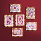 The signed Sealed Delivered stamp sticker set features 6 postage-stamp inspired vinyl stickers inspired by Romance books. The stickers feature illustrations such as strawberries, cherries, hearts, birds and flowers.