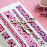 White and pink washi tapes with red roses, green leaves, birds and hearts.