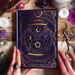 Made of Stars Journal Notebook. Blank dotted dot grid lined Journal. Purple starry covers with gold foiling. Hourglass design with sun and moon and stars. Journaling Bujo notebook. 180pages. Fountain pen friendly. The Quirky Cup Collective