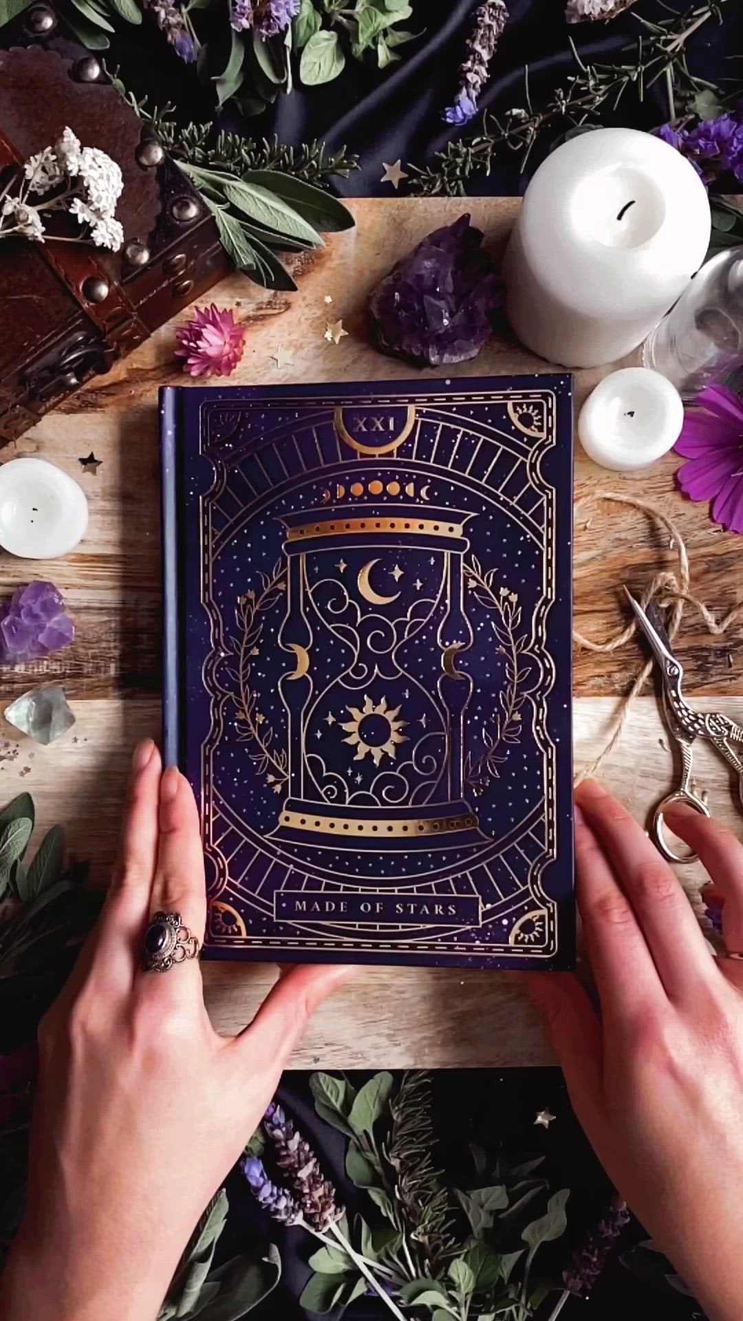 Made of Stars Journal Notebook. Blank dotted dot grid lined Journal. Purple starry covers with gold foiling. Hourglass design with sun and moon and stars. Journaling Bujo notebook. 180pages. Fountain pen friendly. The Quirky Cup Collective