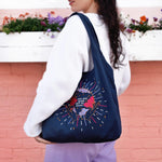 Navy Cotton Reusable Shopping tote bag. Colourful and gold moon and stars stitching embroidery. Eco friendly cotton bag, crystal ball design with 'You Are Made of Stars' text.