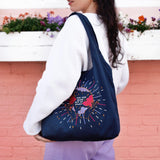 Navy Cotton Reusable Shopping tote bag. Colourful and gold moon and stars stitching embroidery. Eco friendly cotton bag, crystal ball design with 'You Are Made of Stars' text.