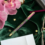 You got this gel pen- black ink- reading journal pen - green and purple - the quirky cup collective