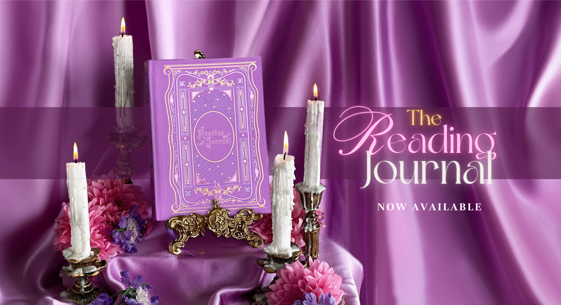 Reading journal placed on a decorated table with flowers and candles, and a sign reading " The reading journal, now available"