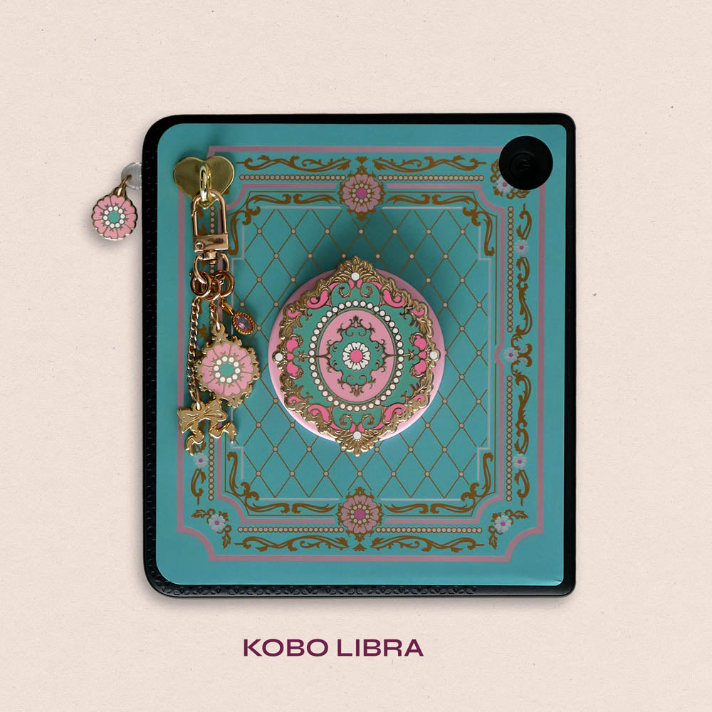 Decorated Kobo Libra with a set of aesthetic ereader accessories that are pastel teal and pink with gold hardware