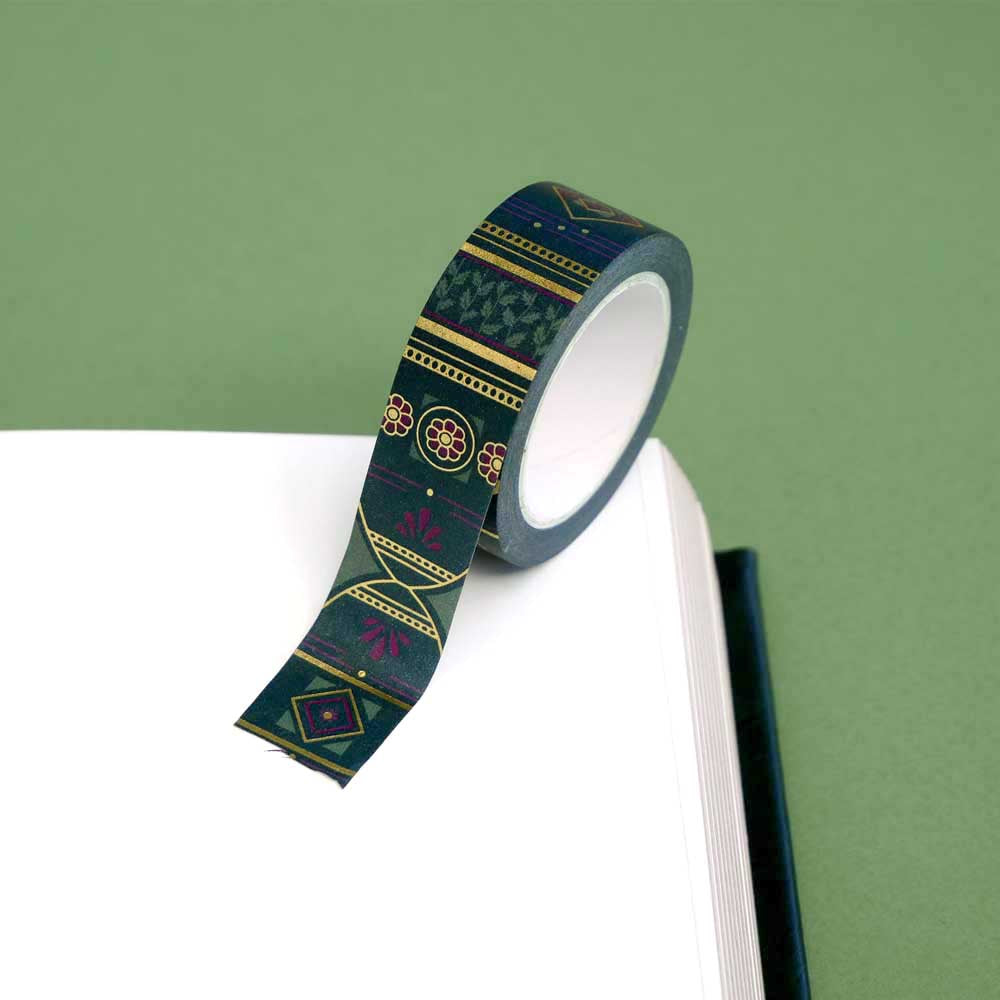 Roll of green washi tape with dark pink flowers, light green leaves and gold foil