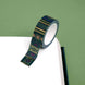 Roll of green washi tape with dark pink flowers, light green leaves and gold foil