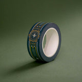 The Sage green variation of the Balteus Literati washi tape. The classic book inspired washi tape design is shown on a green background and features a classic victorian motif with a small flower in shades of dark green, sage green, white and gold.