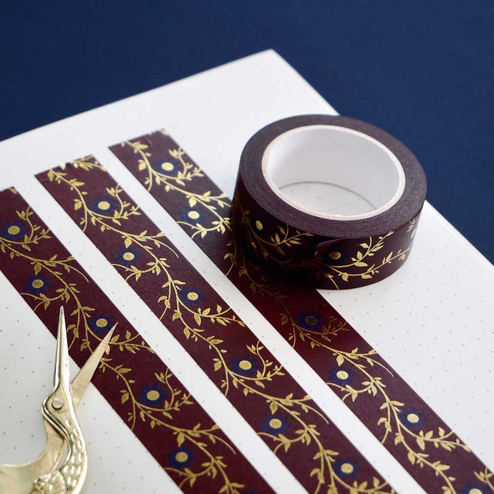 Red washi tape with blue flowers and gold foil foliage