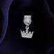 An detail shot of the silver Gilded Heir dust plug on a deep blue fabric background. The fantasy aesthetic kindle decor sees the dust plug feature a small crown motif with red details.