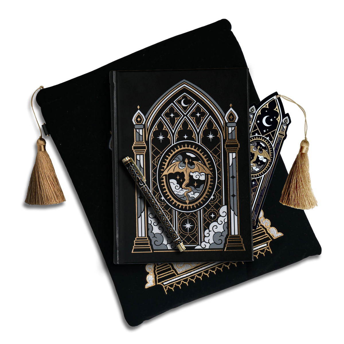 The Dragon Lore journal bundle features a foiled journal, bookmark, pen and book sleeve. All of the elements are black with gold detailing- the bookmark and embroidered book sleeve featuring gold tassels. The designs on all of them feature a flying dragon in gold and white foiling.