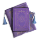 The wisteria journal bundle from the classic book inspired Literati collection. This soft lilac variation includes a book sleeve, journal, pen and bookmark from the collection. All share a slightly Victorian book inspired motif in shades of gold, pink, purple and blue. The foiled journal, pen and bookmark feature intricate gold foiling while the velvet book sleeve is embroidered. The sleeve and bookmark also feature light blue tassels.