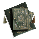 The sage green journal bundle from the classic book inspired Literati collection. This soft green variation includes a book sleeve, journal, pen and bookmark from the collection. All share a slightly Victorian book inspired motif in shades of gold, white and green . The foiled journal, pen and bookmark feature intricate gold foiling while the velvet book sleeve is embroidered. The sleeve and bookmark also feature gold and soft green tassels.