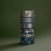 The full set of the Sage green variations of the Literati washi tape by The Quirky Cup Collective sit as rolls in a stack in a green background. The classic book inspired washi tape designs feature classical book inspired designs and ornamentation in shades of dark green, sage green, white and foiled gold.