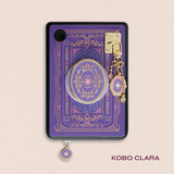 Decorated Kobo Clara with a set of aesthetic ereader accessories that are purple, pink and blue with gold hardware