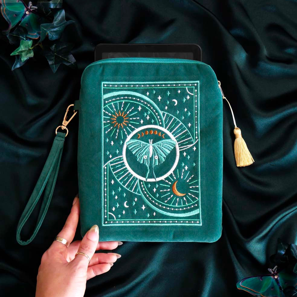 Embroidered Luna moth eReader sleeve in teal with zipper closure, satin lining, wrist strap and back pocket for Kindle or Kobo. Created by The Quirky Cup Collective