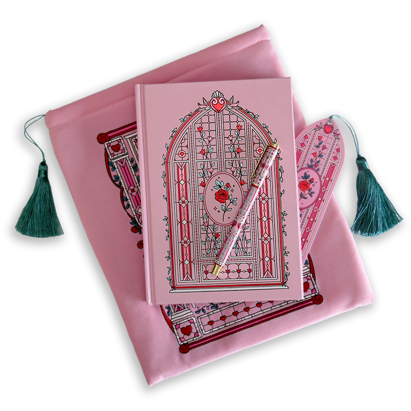 The Sugar & Spice journal bundle includes a Lust & Longing Journal, bookmark, pen and book sleeve. All items are a light pink colour and feature intricate red, light pastel green and white detailing of romantic floral imagery. The Book sleeve features detailed embroidery and both the sleeve and bookmark feature a light mint green tassle.