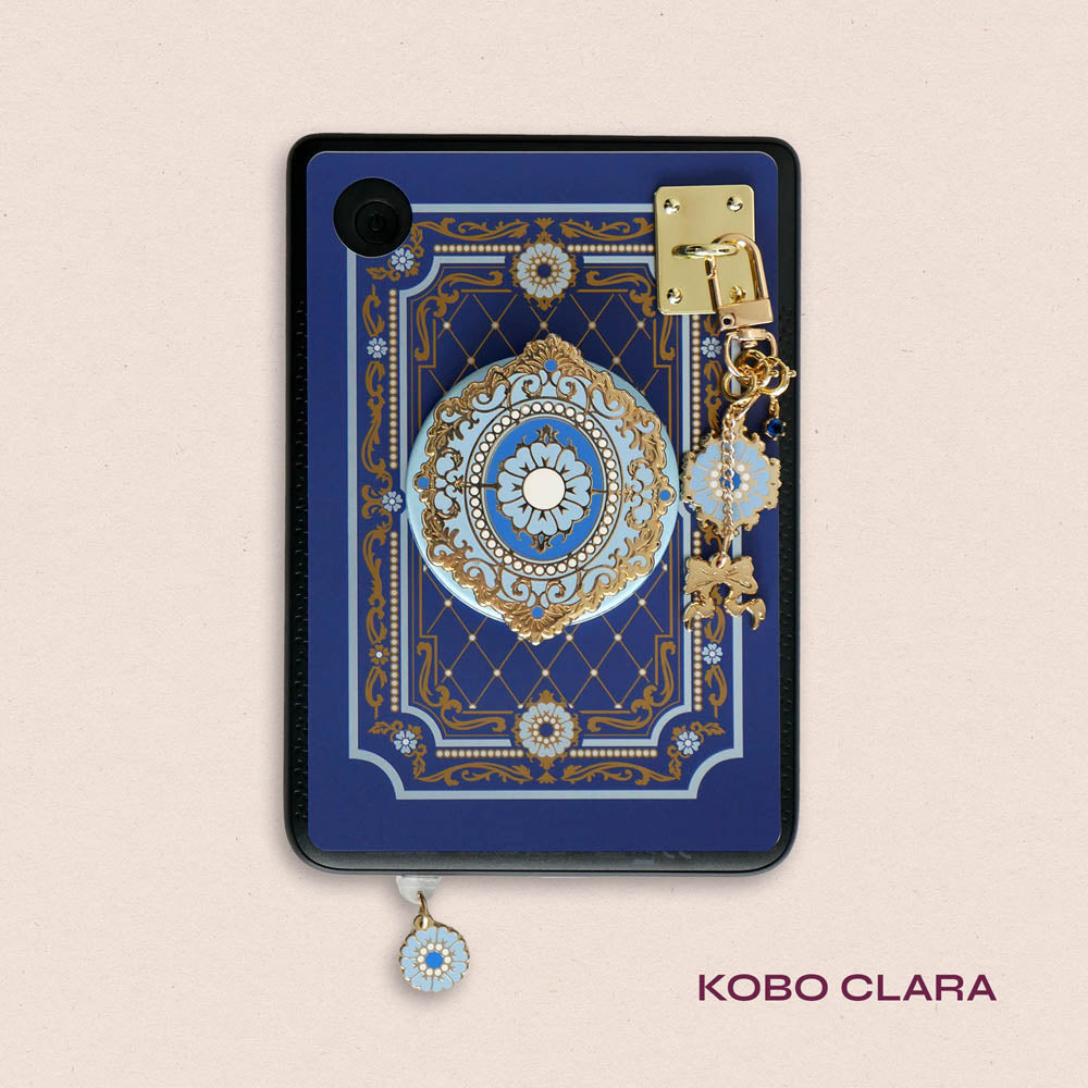 Decorated Kobo Clara with a set of aesthetic ereader accessories that are gold and blue