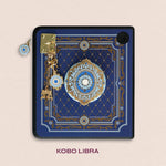 Decorated Kobo Libra with a set of aesthetic ereader accessories that are gold and blue