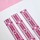 Pink washi tape with small pink and red hearts and diamonds