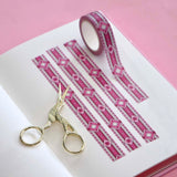 Pink washi tape with small pink and red hearts and diamonds