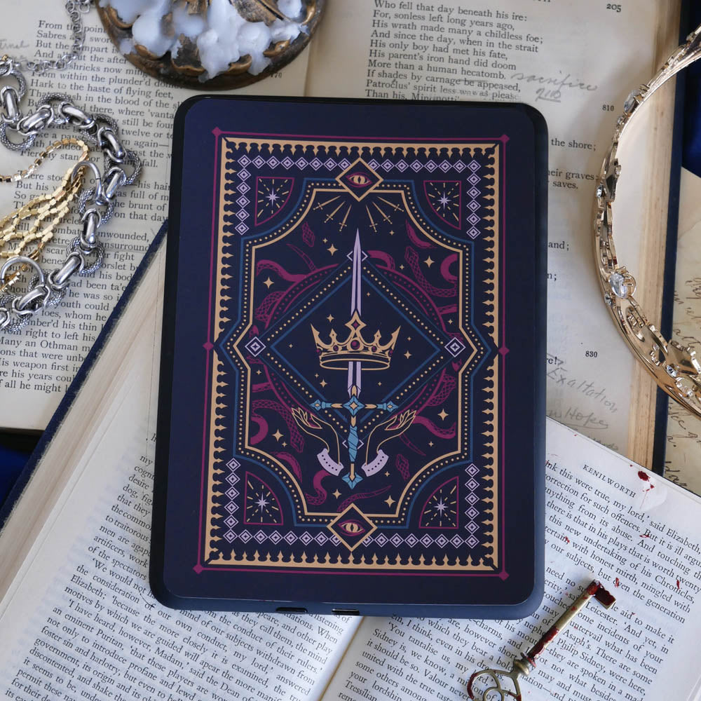 Decorative dark and moody kindle sticker against a dark background e reader