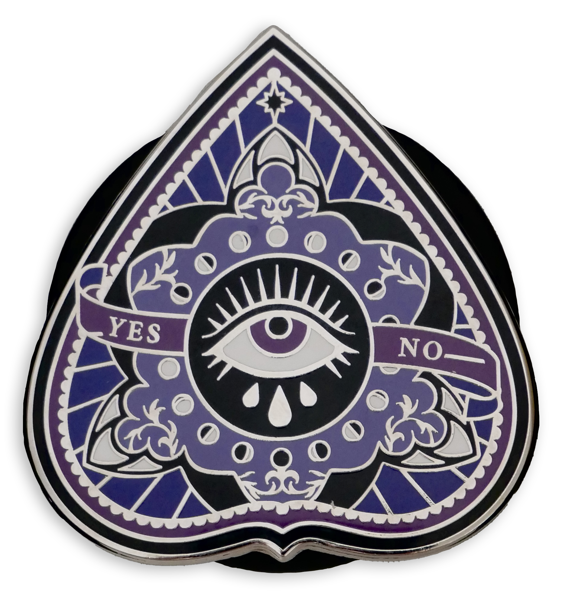 The Quirky Cup Collective planchette kindle grip (similar to an enamel pop socket, also known as a clingie!) features an ouija planchette design with an eye and the words yes and now in shades of purple, black and gold.