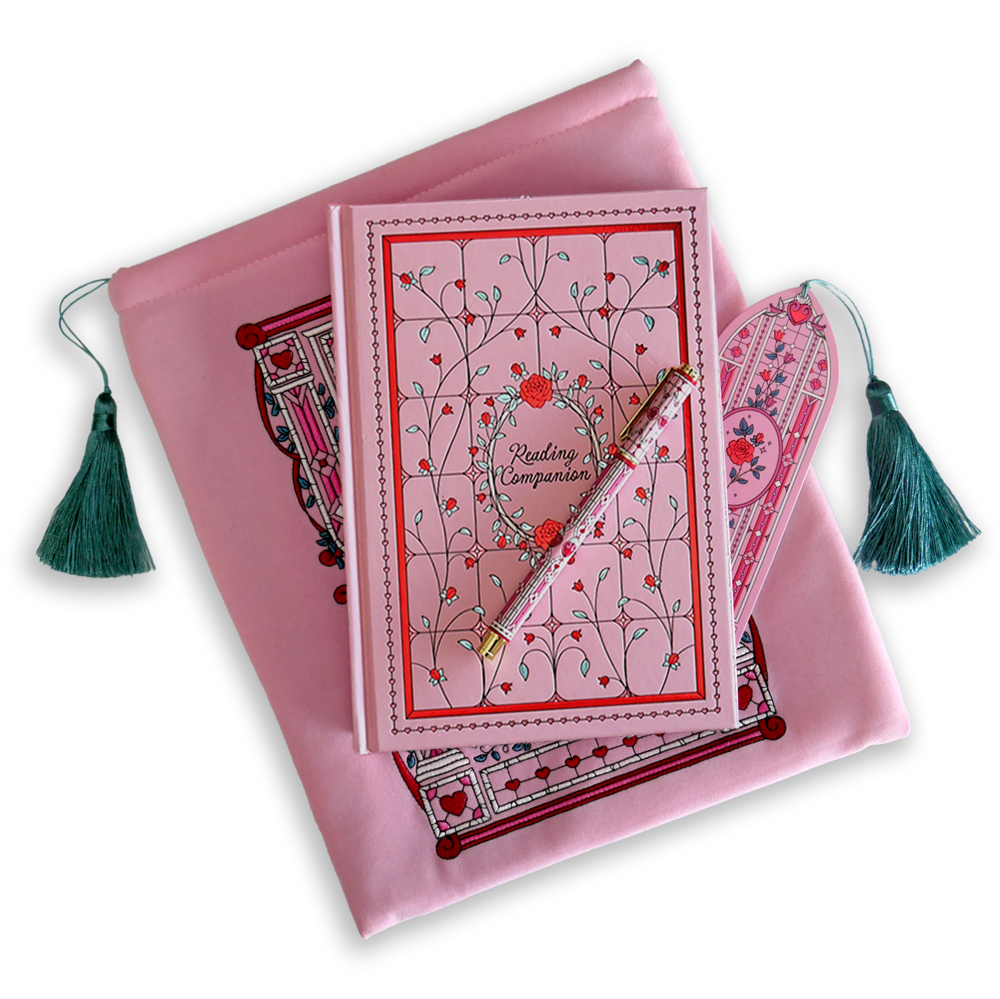 The Sugar & Spice journal bundle includes a Reading Companion Journal, bookmark, pen and book sleeve. All items are a light pink colour and feature intricate red, light pastel green and white detailing of romantic floral imagery. The Book sleeve features detailed embroidery and both the sleeve and bookmark feature a light mint green tassle.
