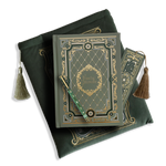 The sage green reading companion bundle from the classic book inspired Literati collection. This soft green variation includes a book sleeve, reading companion journal, pen and bookmark from the collection. All share a slightly Victorian book inspired motif in shades of gold, white and green . The foiled reading companion, pen and bookmark feature intricate gold foiling while the velvet book sleeve is embroidered. The sleeve and bookmark also feature gold and soft green tassels.