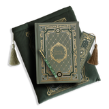 The sage green reading companion bundle from the classic book inspired Literati collection. This soft green variation includes a book sleeve, reading companion journal, pen and bookmark from the collection. All share a slightly Victorian book inspired motif in shades of gold, white and green . The foiled reading companion, pen and bookmark feature intricate gold foiling while the velvet book sleeve is embroidered. The sleeve and bookmark also feature gold and soft green tassels.