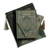 The sage green reading journal bundle from the classic book inspired Literati collection. This soft green variation includes a book sleeve, reading journal, pen and bookmark from the collection. All share a slightly Victorian book inspired motif in shades of gold, white and green . The foiled reading journal, pen and bookmark feature intricate gold foiling while the velvet book sleeve is embroidered. The sleeve and bookmark also feature gold and soft green tassels.