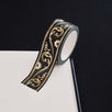 Black washi tape with white flowers and gold foil filagree