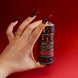 The full set of Serpents and Swords washi tapes, a fantasy book inspired collection by The Quirky Cup Collective, are held in a hand with intricate red nails in front of a red backround. The five washi tapes are in shades of red, black and white with intricate gold foiling. The designs feature motifs of snakes, crowns, swords, goblets , stars and serpents and perfectly match the fantasy book aesthetic.