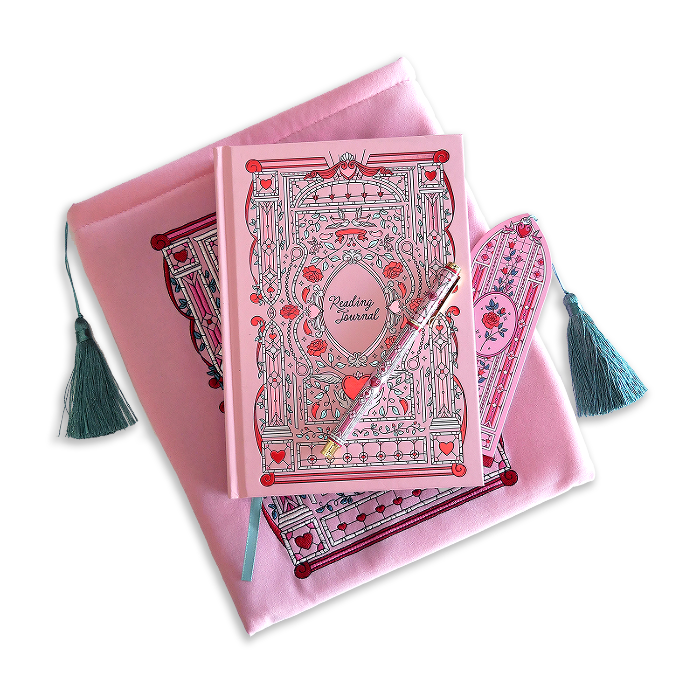 The Sugar & Spice journal bundle includes a Reading Journal, bookmark, pen and book sleeve. All items are a light pink colour and feature intricate red, light pastel green and white detailing of romantic floral imagery. The Book sleeve features detailed embroidery and both the sleeve and bookmark feature a light mint green tassle.